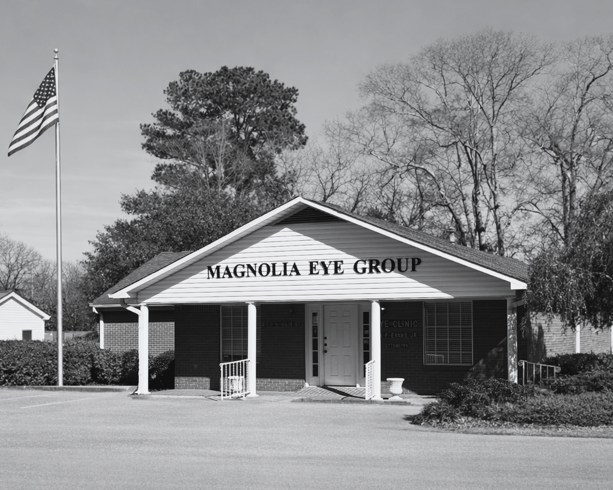 Magnolia Eye Group Logo with Stylized Eye Icon – Magnolia Eye Group Calhoun City