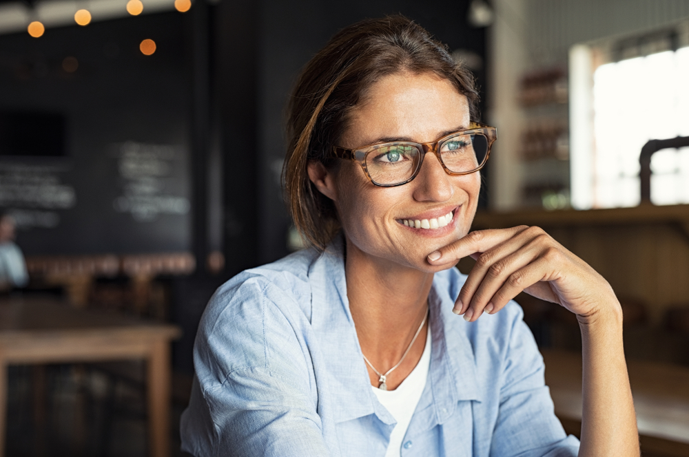 Brunette woman wearing eye glasses - Eye Exam in Oxford