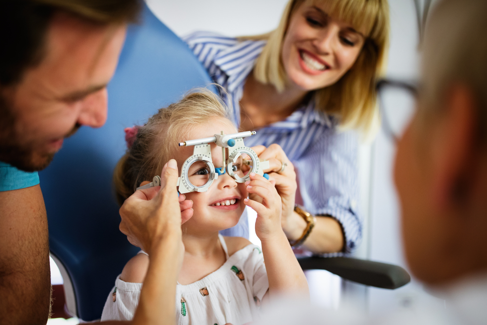 little girl having an eye exam