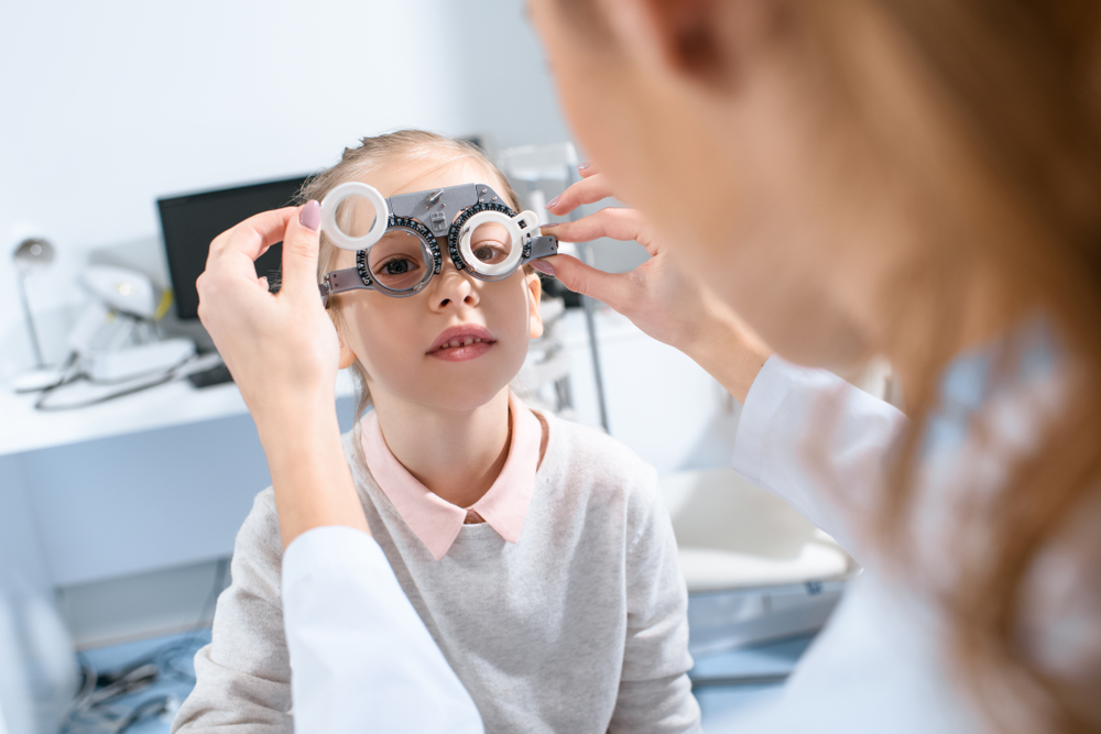 little girl having an eye exam